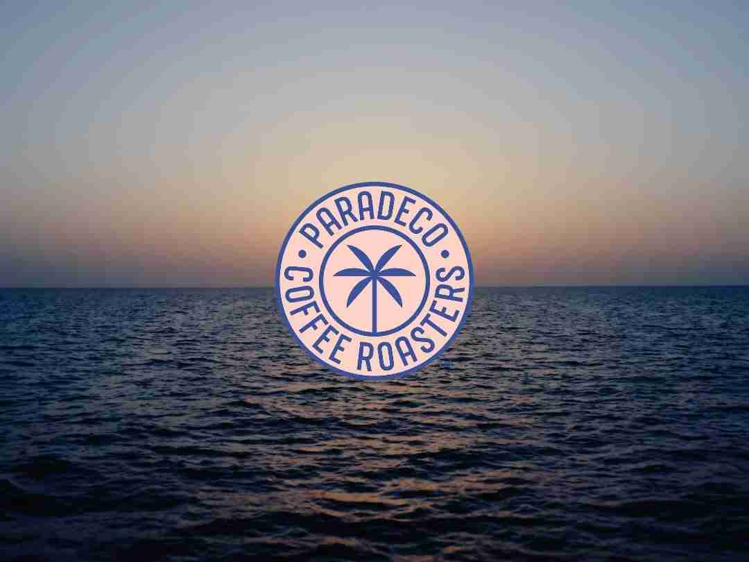Paradeco Emblem on top of the St. Tampa Bay waterline horizon at Sunrise.